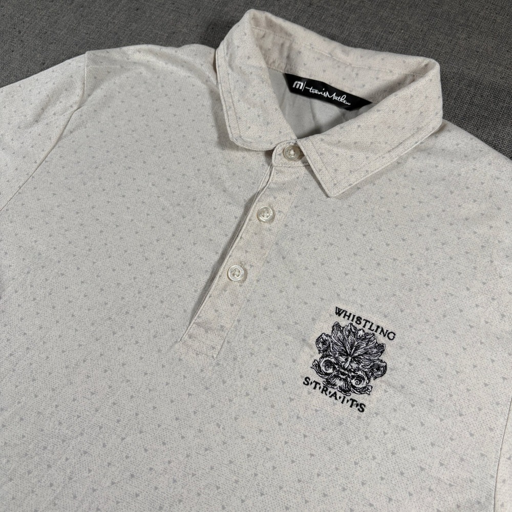 TravisMathew Polo Shirt Mens Size M Cream Whistling Straits Logo Short Sleeve
